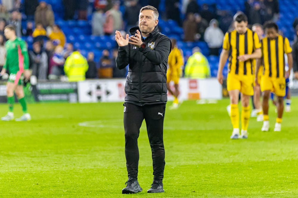 Port Vale Manager Jon Brady applauds the fans after the EFL Sky Bet League 1 match between Cardiff City and Port Vale at the Cardiff City Stadium, Cardiff, UK on 22 April 2026.