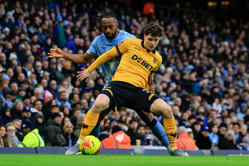 Ladislav Krejci (37) of Wolverhampton Wanderers is challenged by Antione Semenyo (42) of Manchester City during the Premier League match between Manchester City and Wolverhampton Wanderers at the Etihad Stadium, Manchester, UK on 24 January 2026.