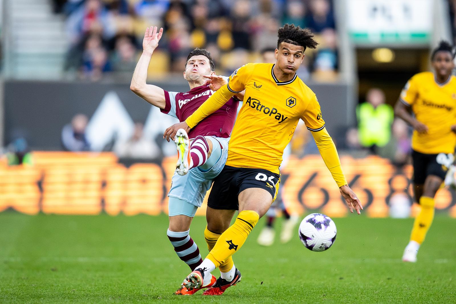 Wolverhampton Wanderers forward Leon Chiwome (84) battles for possession during the Premier League match between Wolverhampton Wanderers and West Ham United at Molineux, Wolverhampton, England on 6 April 2024.