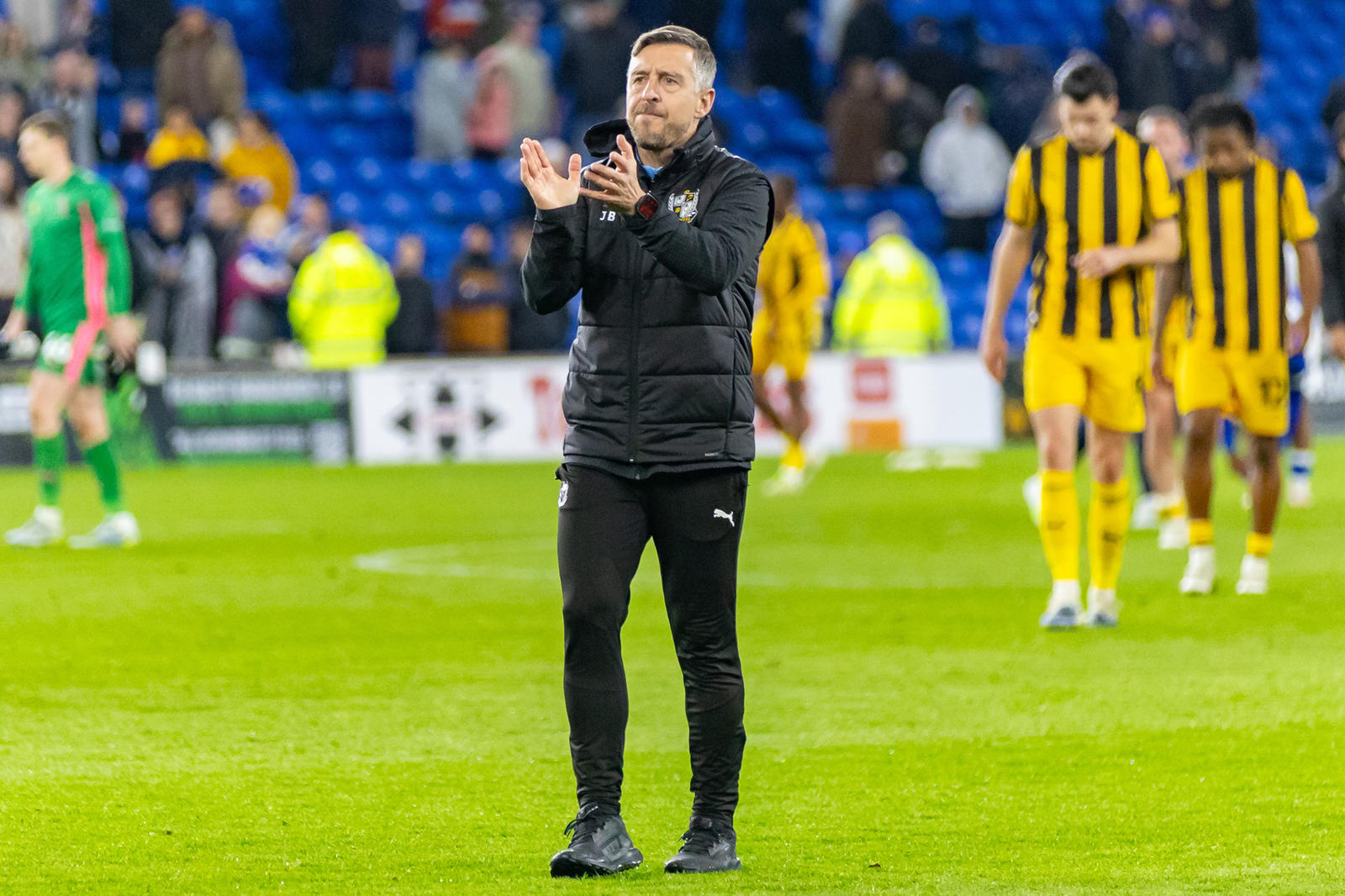 Port Vale Manager Jon Brady applauds the fans after the EFL Sky Bet League 1 match between Cardiff City and Port Vale at the Cardiff City Stadium, Cardiff, UK on 22 April 2026.